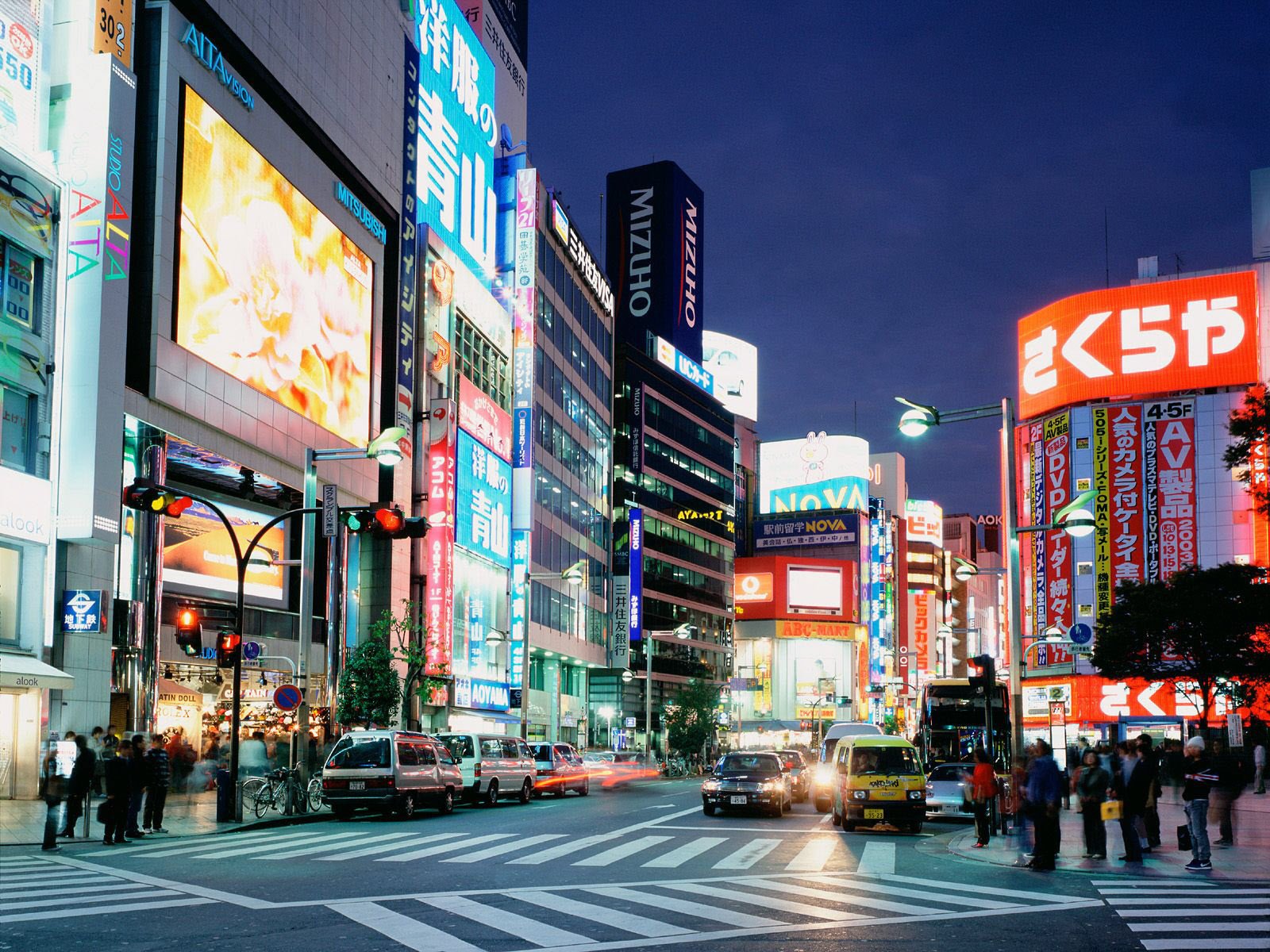 colorful advertising center light cities night city lights auto signage shop windows neon lights lanterns traffic light zebra pedestrian crossing pedestrians screen intersection megapoli