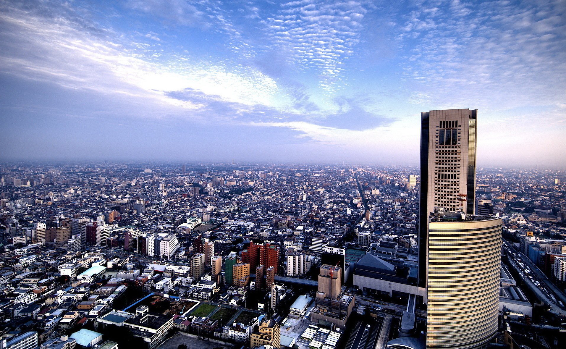high-rise building millions of the population panorama the city skyscrapers home building height the sky clouds view