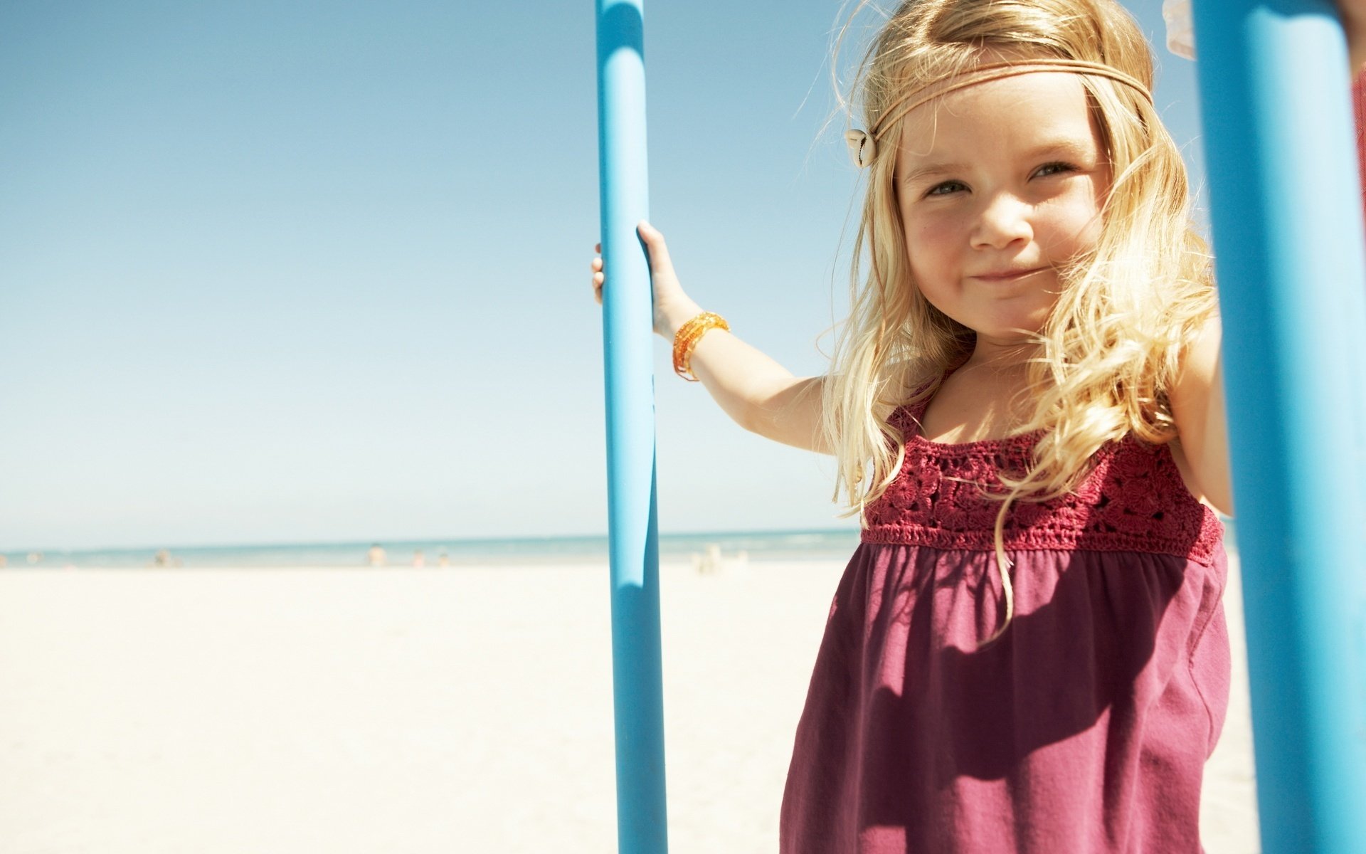 blonde girl on the beach the sun look blonde eyes face portrait