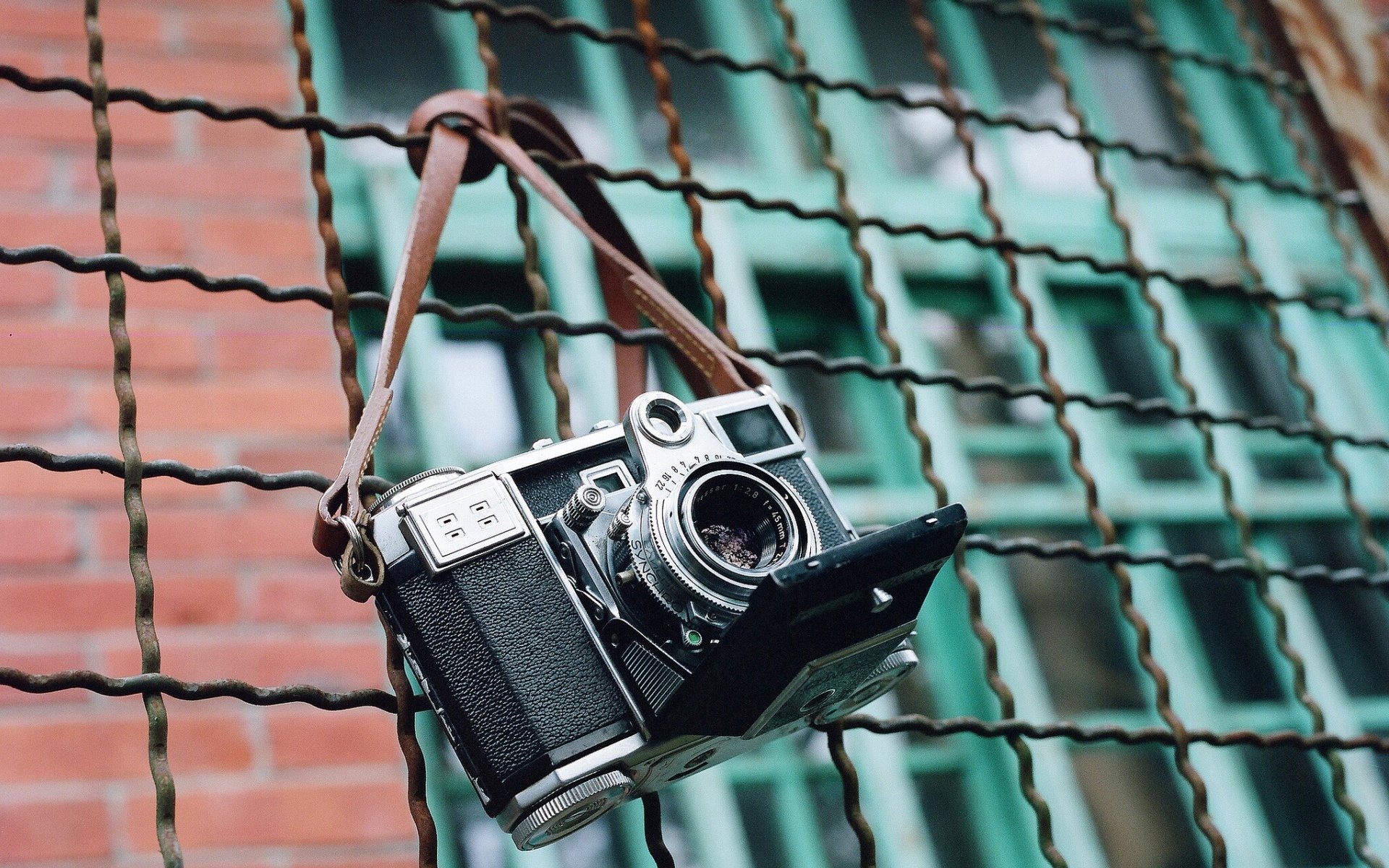macchina fotografica recinzione sfondo
