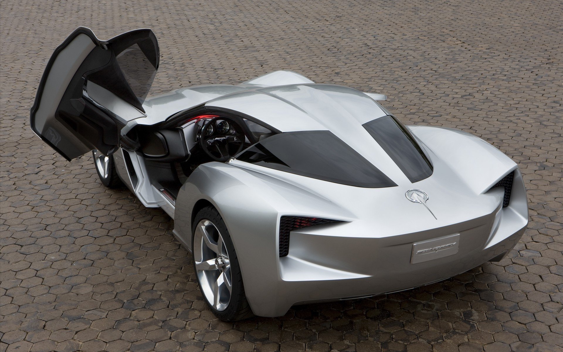 anniversary corvette stingray concept offene tür pflasterstein platz silber sportwagen transport auto kraftfahrzeuge