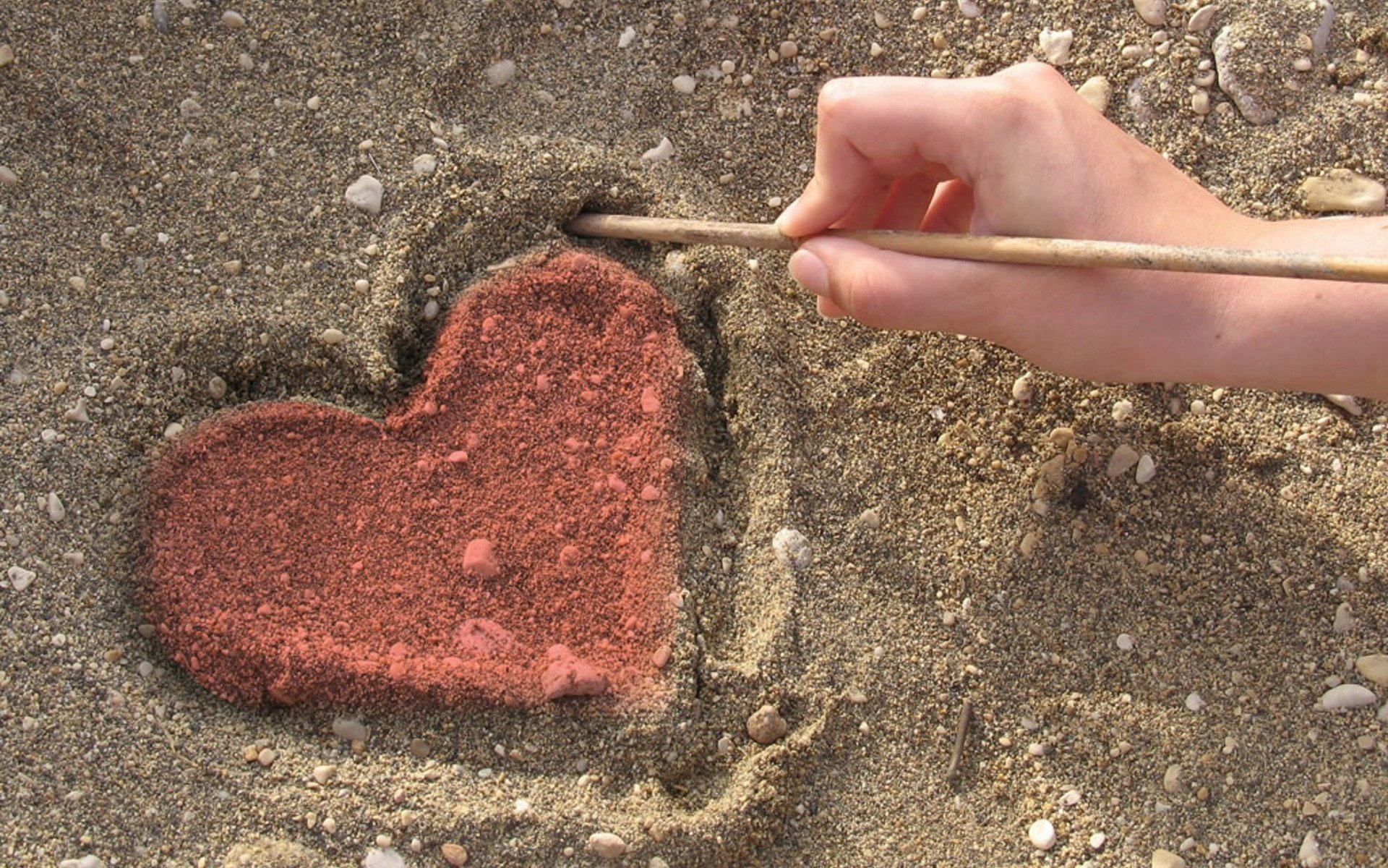 drawing in the sand heart love