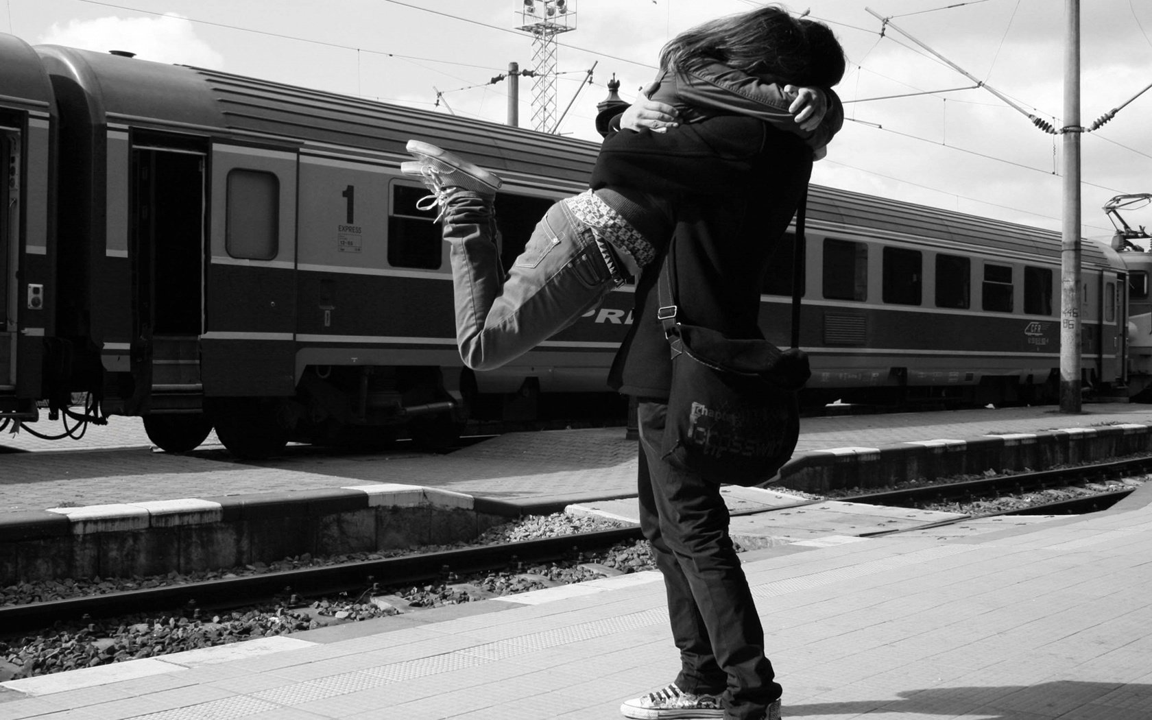 peron station meeting a couple in love train hug people rails the car romance tenderness passion feelings love date lovers pair men women