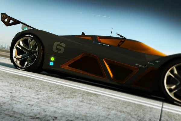 Black and orange supercar on asphalt against the sky