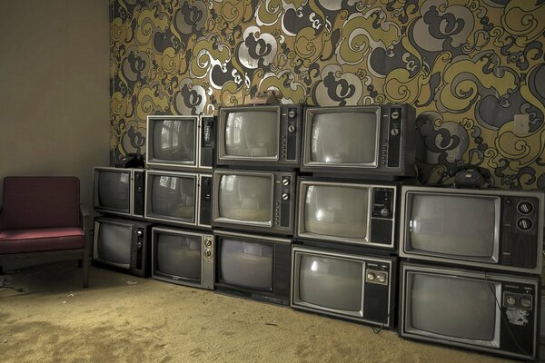 There are a lot of Soviet televisions in the room