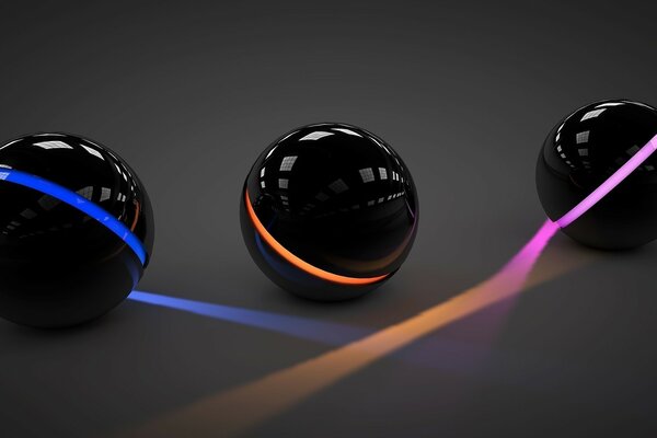 Neon light emitted by smooth black balls