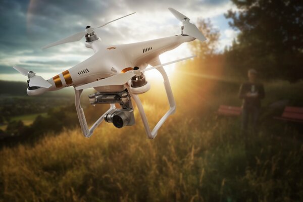 Copter in the field in the sunlight