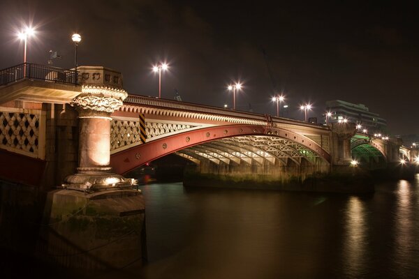 Drawbridge and night lights of the city