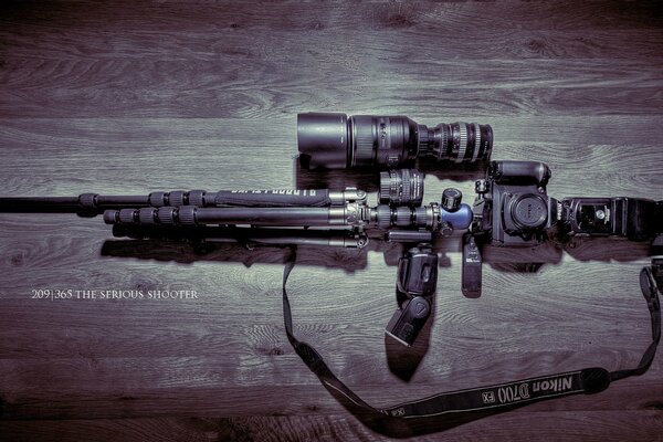 Photo d un fusil de chasse avec vue sur fond en bois