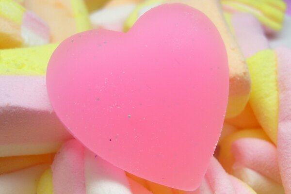 Sweets in a box in the form of a pink heart
