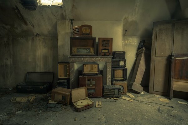 Old radios in an abandoned room