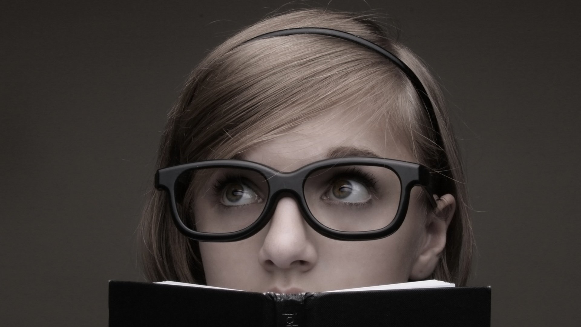 girl black frame book portrait look eyes face glasses mind reading the study background