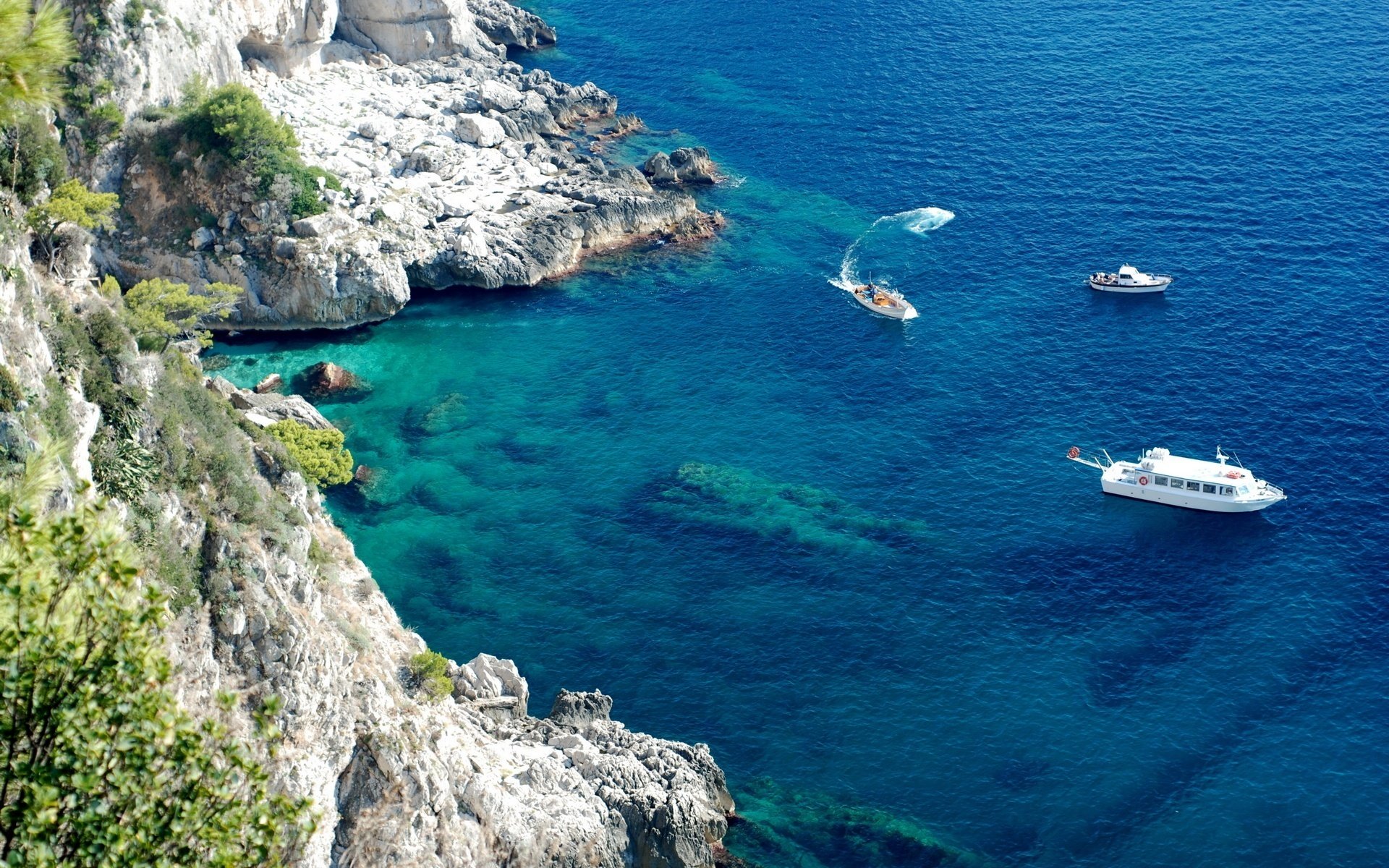 mountain ranges bay boats water shore sea height cliff bay harbor rocks bottom landscape nature