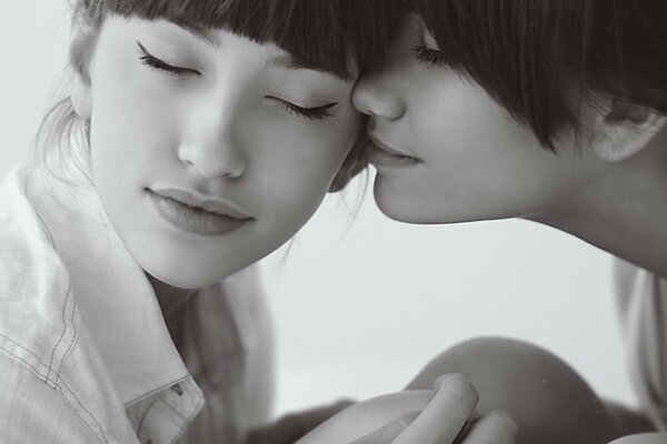 Two girls in white shirts black and white photo