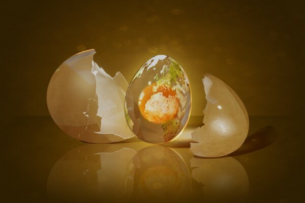 Image d un œuf fendu dans lequel le jaune est représenté comme la planète terre
