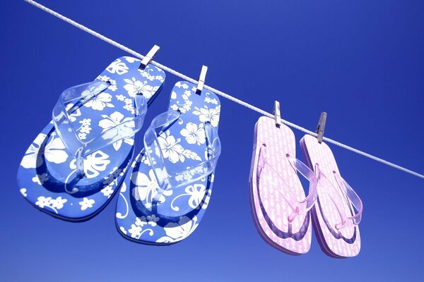 Flip-flops hanging on a clothesline