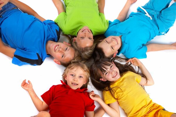 Happy faces of children in sunny suits