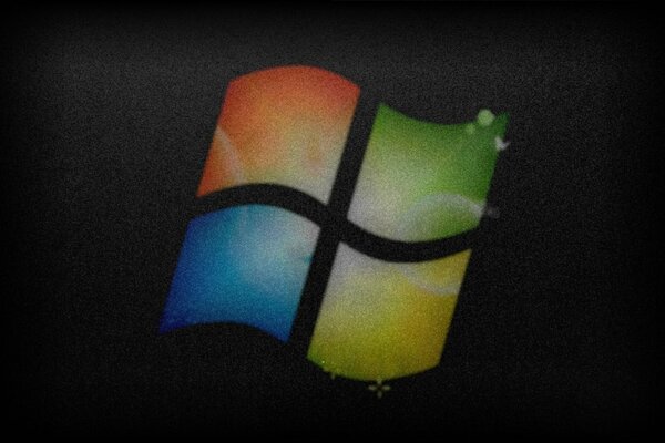 Przyciemnione logo Windows na ciemnym tle