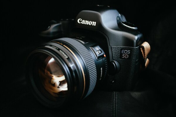 Professional camera on a black background