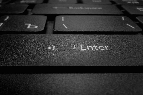 Enter button on the computer keyboard