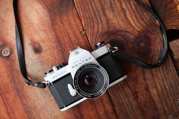 Retro pentax camera on the table