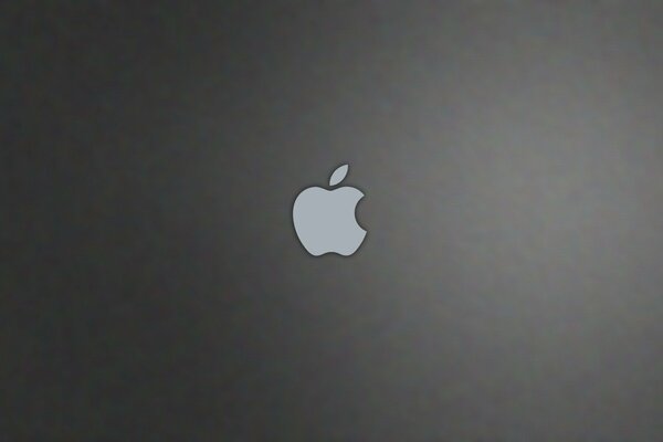 Classic iPhone logo on a dark background