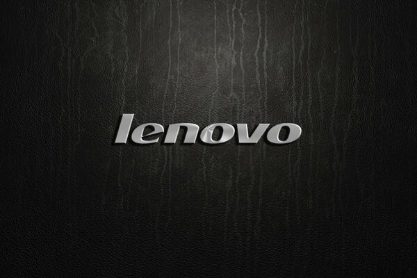 Silver Lenovo logo on a black background