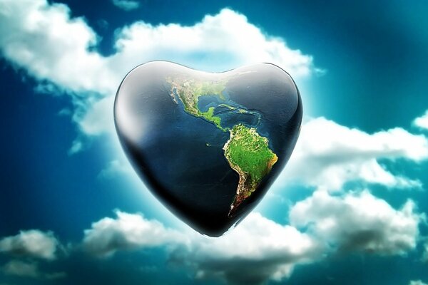 The heart-shaped earth in the blue sky