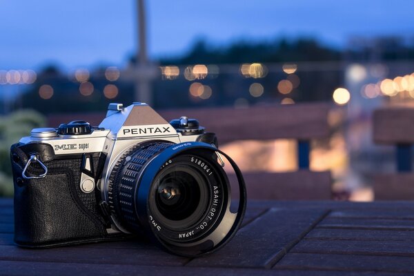 Pentax me super camera with urban background