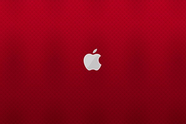 Emblemas de apple sobre fondo rojo