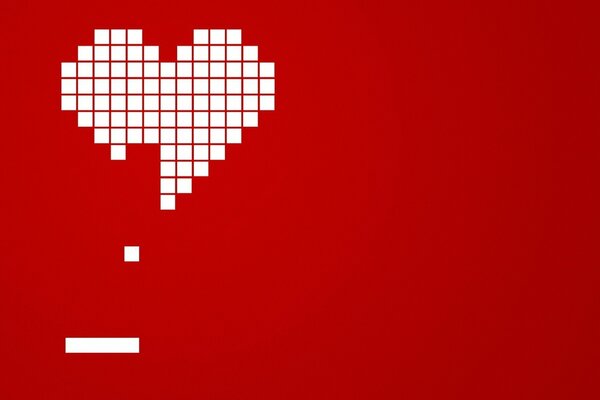 Corazón blanco sobre fondo rojo en un juego de ordenador