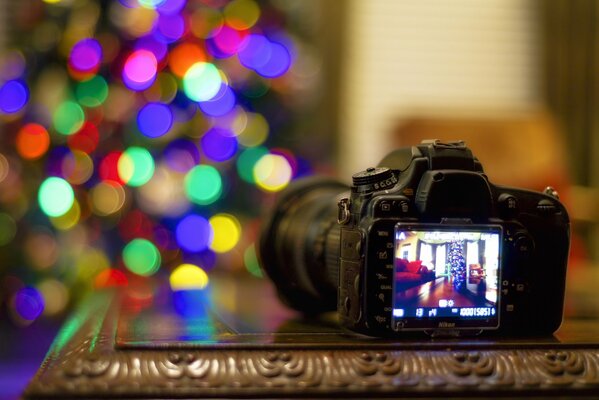 Digital camera on the table with baked interior