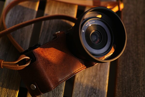 Canon camera in a brown leather case