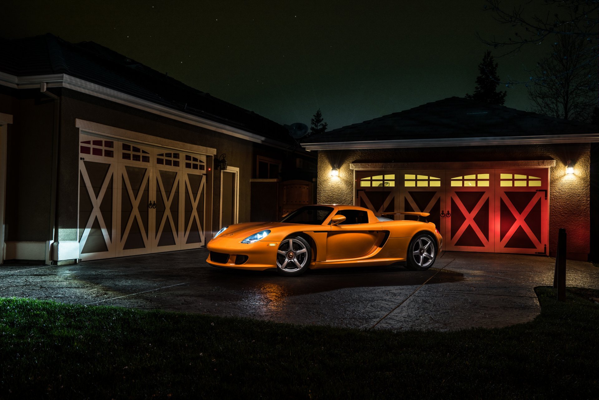 porsche carrera gt orange borealis exotisch supersportwagen licht nigth vorne