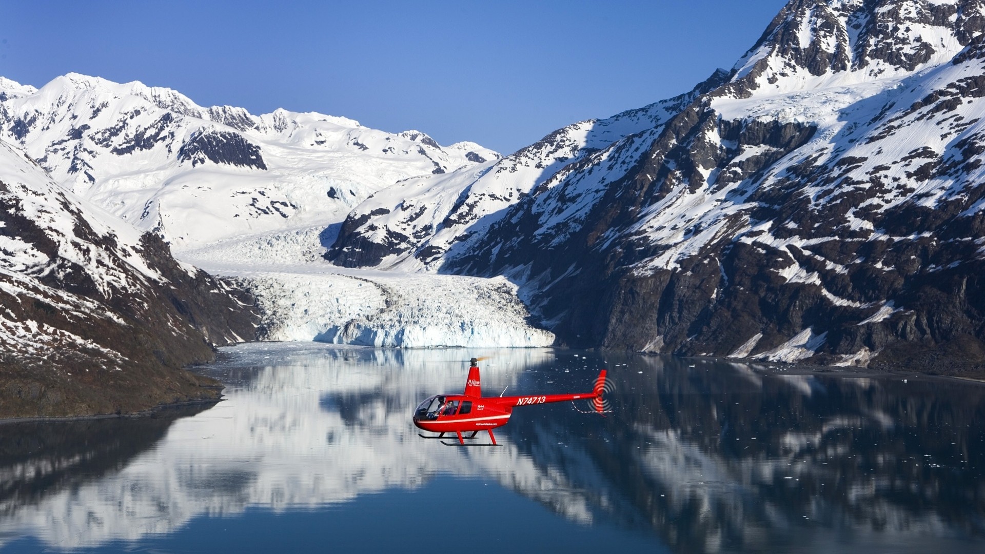 lago rescate nieve montañas rojo