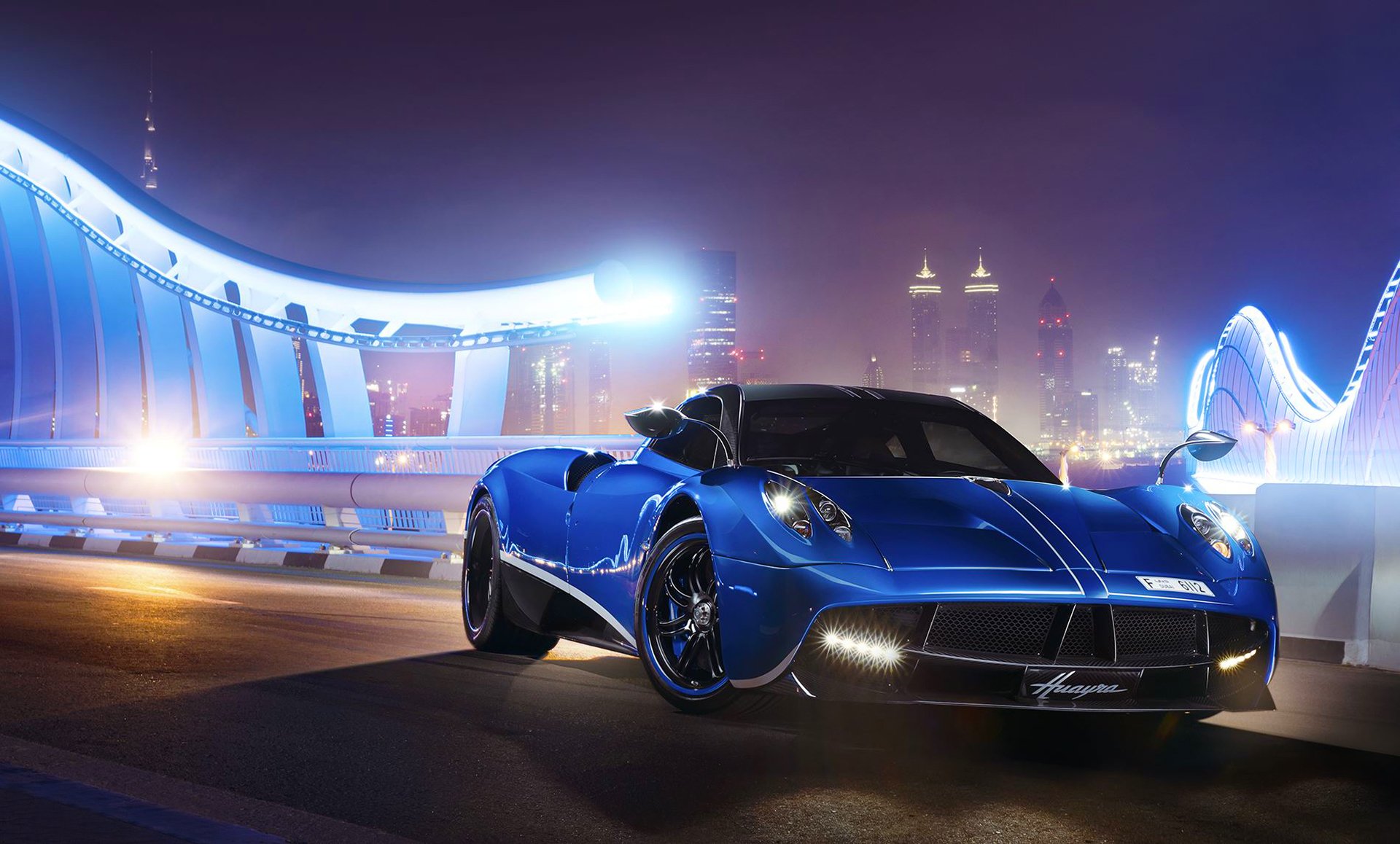 pagani huayra blue supercar ligth nigth track front