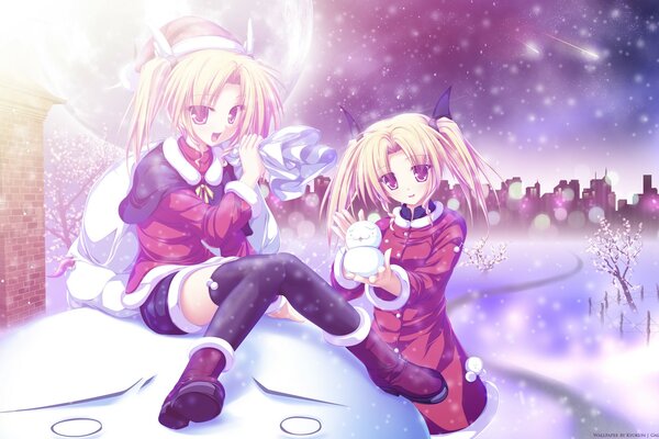 Dos chicas en un hermoso paisaje de invierno