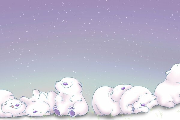 Pequeños osos polares jugueteando y durmiendo en la nieve
