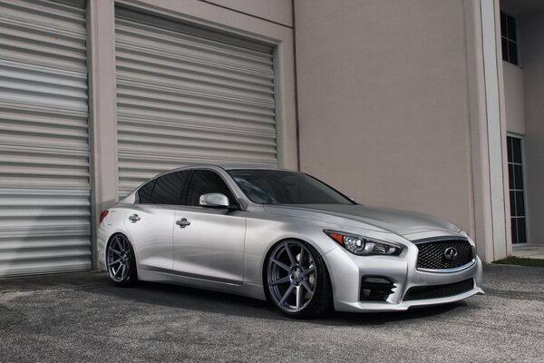 Silver Infiniti in a chic tuning performance