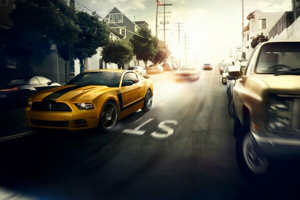 Ford Mustang żółty przy prędkości
