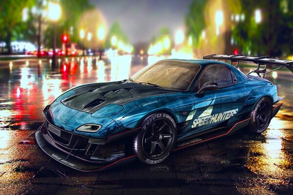 Blauer Mazda rx- 7 speedhunters auf Nachtparkhintergrundtapete