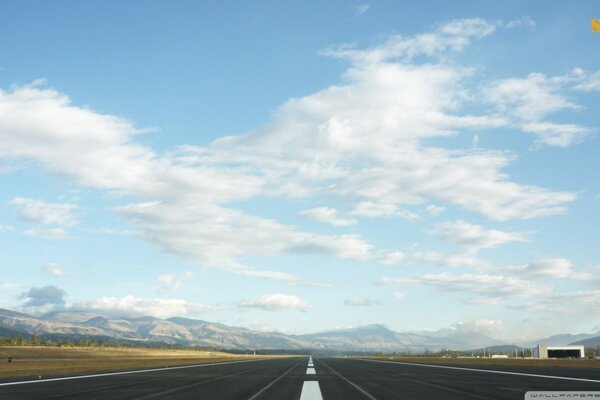 Runway on the background of mountainous terrain