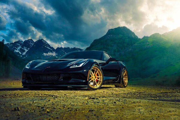 Chevrolet corvette on the background of a mountain landscape