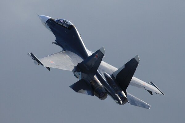 Russian two-seat su-30 on a gray background