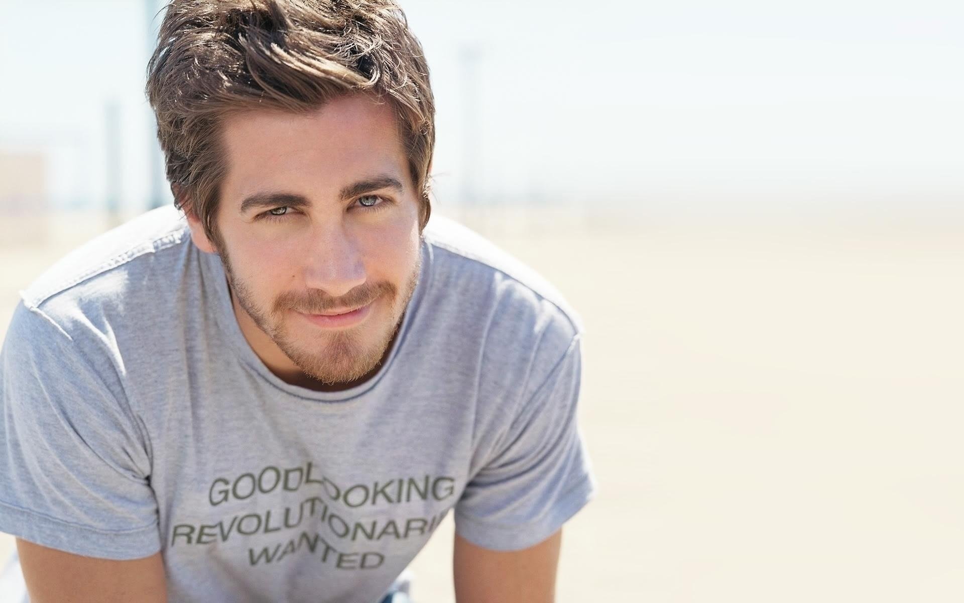 actor guy jake gyllenhaal portrait look actors smile t-shirt male light background white background handsome beard mustache eyes face