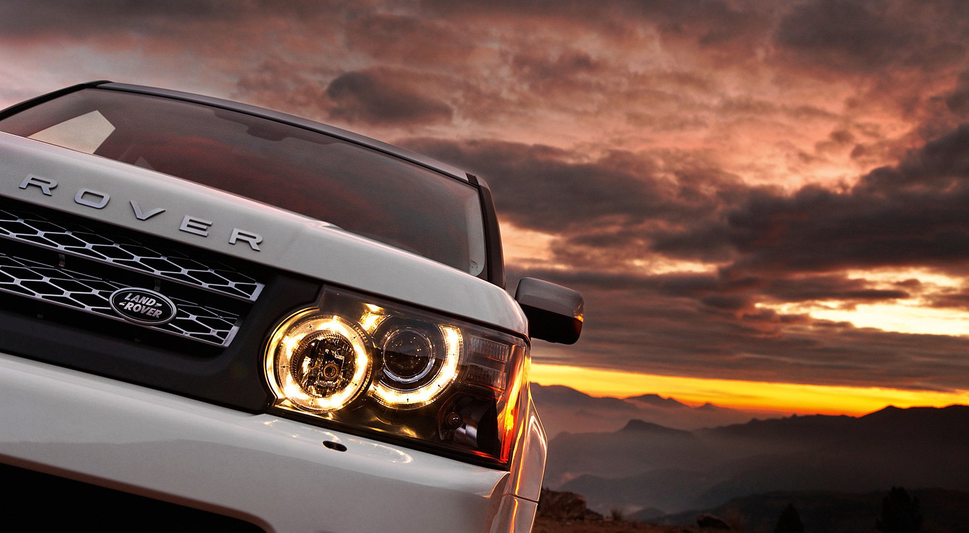 range rover blanc auto coucher de soleil montagnes voiture nuages phares voitures transport véhicules