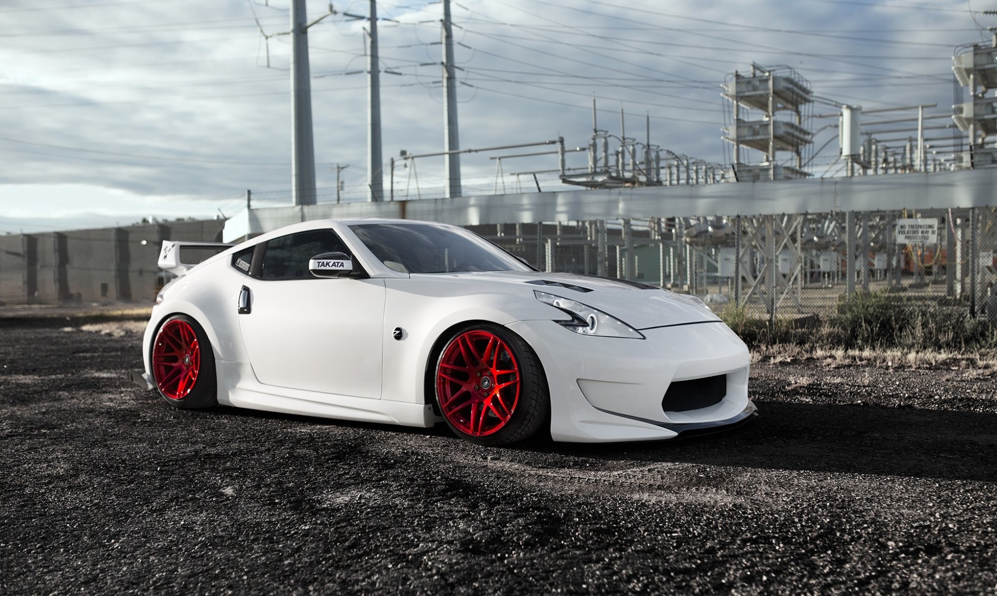 nissan 370z limpio pedigrí blanco posición rojo ruedas frente