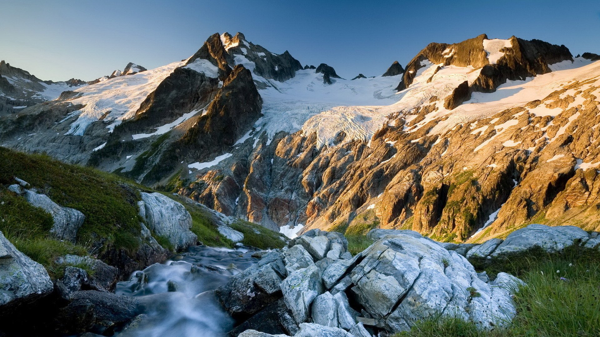 mountains grass ice cold spring pagarba river hills nature height the sky