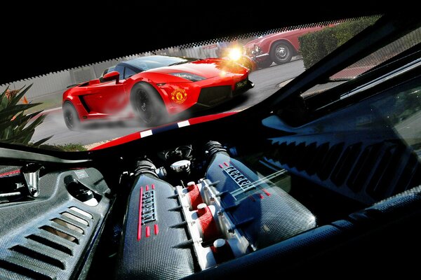 Ferrari rouge vif et son moteur