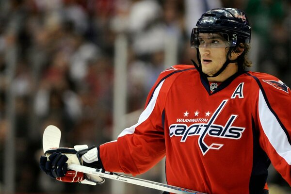 Hockey player Alexander Ovechkin with a stick